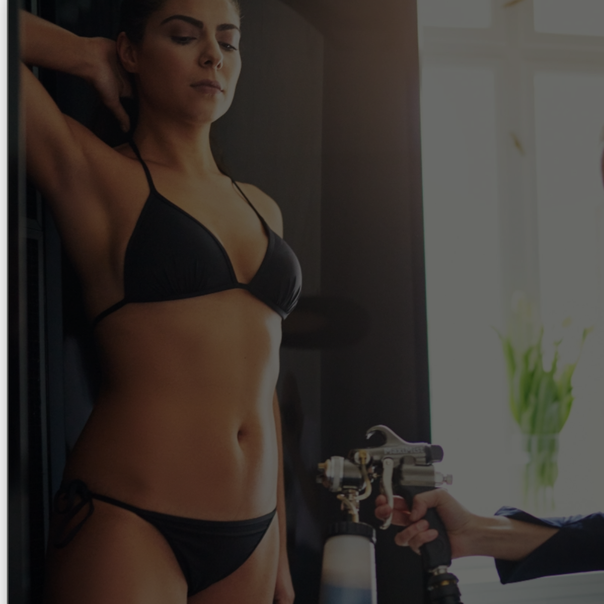 Professional spray tan being applied at home in Ayrshire | BeautyRokz